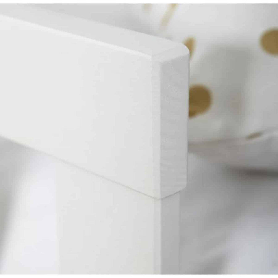 Close-up of a white ceramic bowl with a gold interior